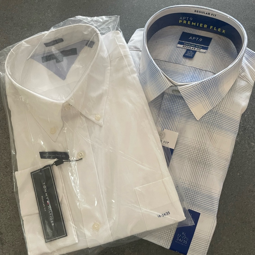 Two long sleeved men collared shirts